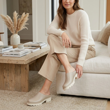 Vionic Fairfax Camel loafer mule worn with cream trousers