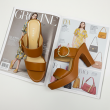 MOODBOARD EVERBEST tan faux leather platform sandals with wide straps and a large gold-tone buckle on a block heel.