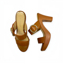 MOODBOARD EVERBEST tan faux leather platform sandals with wide straps, block heels, and large gold-tone buckles.