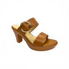 MOODBOARD tan faux leather platform sandals with wide straps, block heel, and a large gold-tone buckle detail.